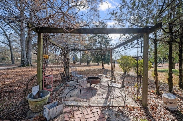 view of patio featuring a fire pit