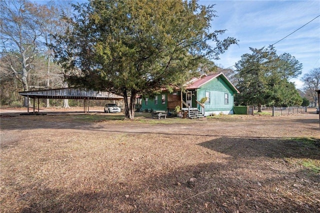 view of front of house featuring a carport