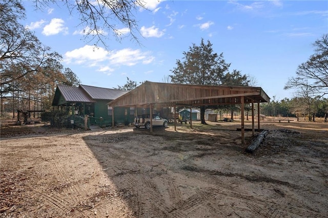 exterior space featuring a carport