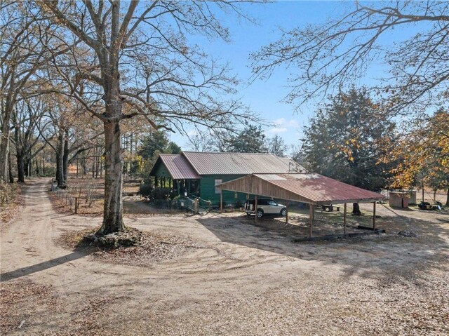 exterior space featuring a carport