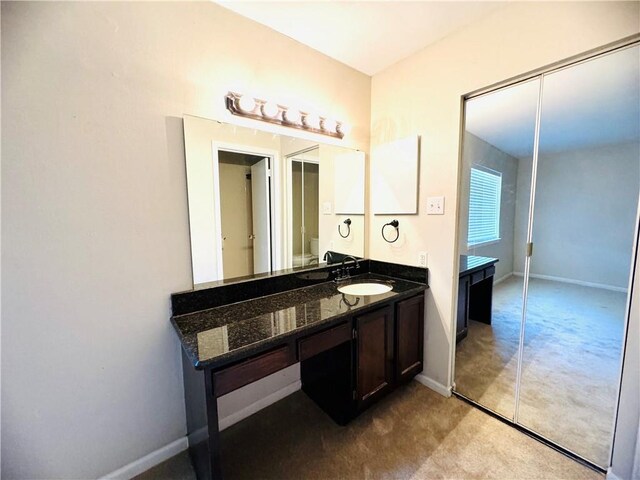 6701 Dickens Ferry Rd Unit 22, Mobile, AL 36608 - bathroom with baseboards and vanity