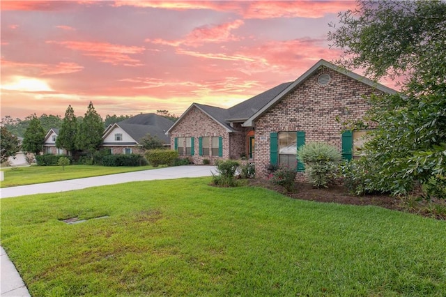 view of front of home featuring a yard