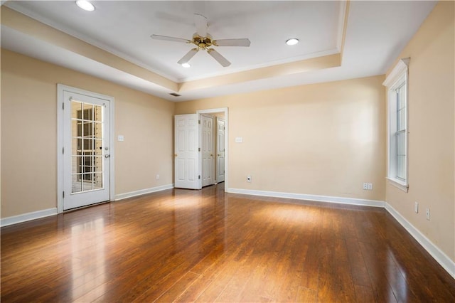 9996 Wedgefield Ct, Mobile, AL 36608 - spare room featuring a tray ceiling, a ceiling fan, hardwood / wood-style flooring, crown molding, and recessed lighting
