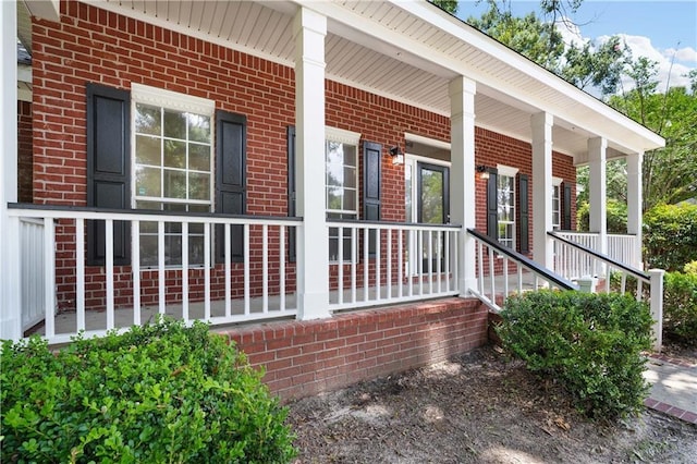 9996 Wedgefield Ct, Mobile, AL 36608 - entrance to property featuring brick siding and covered porch