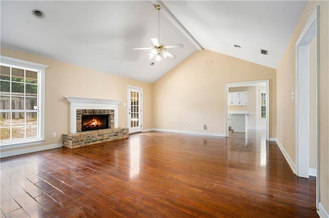 9996 Wedgefield Ct, Mobile, AL 36608 - unfurnished living room with a ceiling fan, wood finished floors, and a fireplace