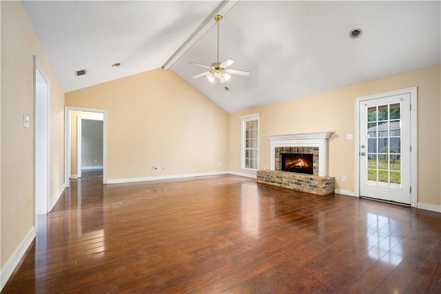9996 Wedgefield Ct, Mobile, AL 36608 - unfurnished living room featuring ceiling fan, vaulted ceiling, wood finished floors, and a brick fireplace