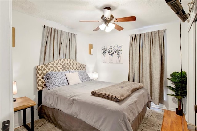 5023 Freeway Ln, Mobile, AL 36619 - bedroom featuring ceiling fan and light hardwood / wood-style flooring