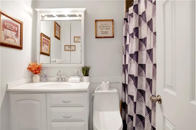 5023 Freeway Ln, Mobile, AL 36619 - bathroom featuring vanity, toilet, and walk in shower