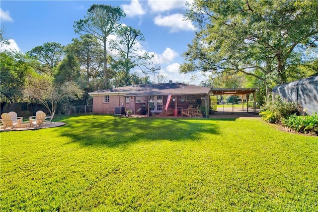 5023 Freeway Ln, Mobile, AL 36619 - back of property featuring cooling unit and a lawn
