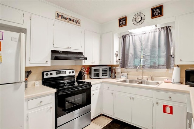 5023 Freeway Ln, Mobile, AL 36619 - kitchen featuring white refrigerator, electric stove, sink, and white cabinets