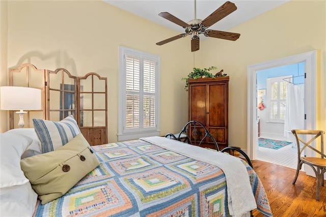 bedroom with light wood-type flooring and ceiling fan