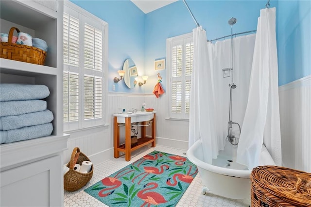 bathroom with plenty of natural light and tile patterned flooring