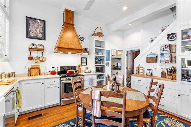 dining room featuring ceiling fan and light wood-type flooring