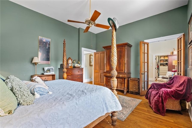 bedroom featuring ceiling fan and wood-type flooring