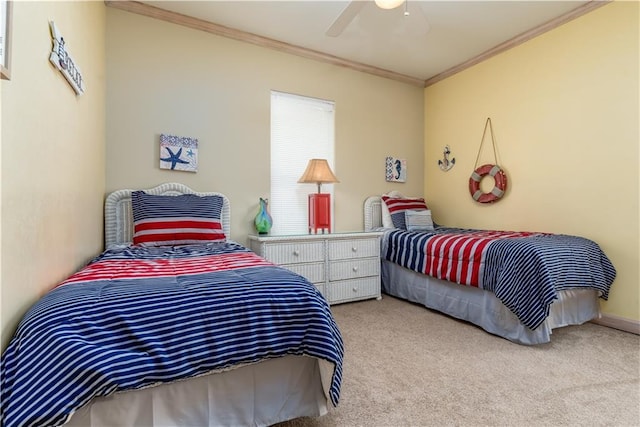 carpeted bedroom featuring ceiling fan and crown molding