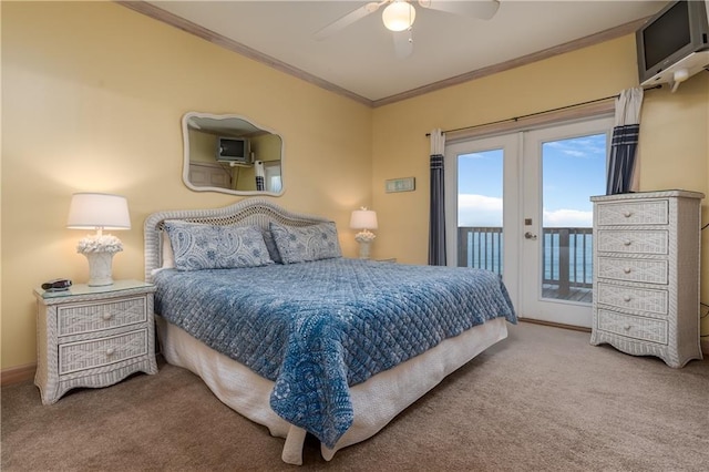 carpeted bedroom with ceiling fan, ornamental molding, access to outside, and french doors