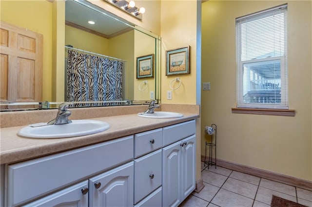 bathroom featuring tile patterned floors and vanity