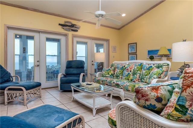 living room featuring ceiling fan, french doors, light tile patterned floors, and ornamental molding