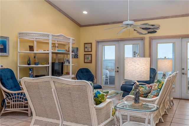 living room featuring light tile patterned floors, a wealth of natural light, and french doors