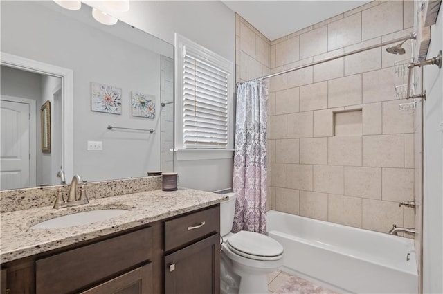 full bathroom featuring shower / tub combo with curtain, tile patterned floors, vanity, and toilet