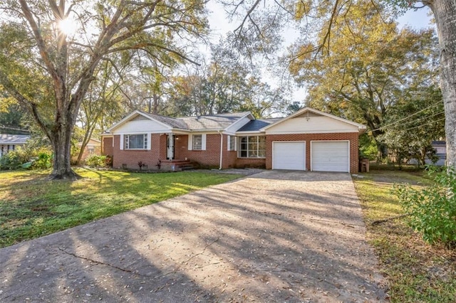 single story home featuring a garage and a front yard