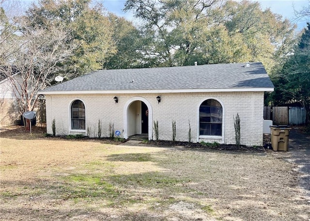 view of front of property with a front lawn