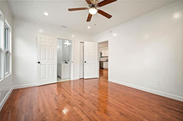 4 Straight St, Mobile, AL 36604 - interior space with recessed lighting, visible vents, baseboards, and hardwood / wood-style flooring