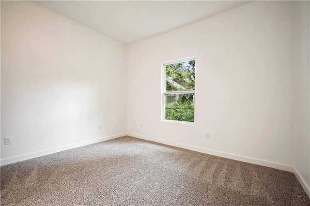 4 Straight St, Mobile, AL 36604 - carpeted empty room featuring baseboards