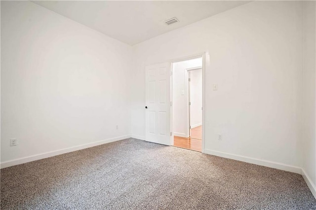 4 Straight St, Mobile, AL 36604 - empty room featuring carpet floors, visible vents, and baseboards