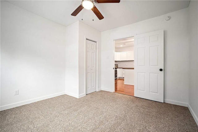4 Straight St, Mobile, AL 36604 - unfurnished bedroom featuring ceiling fan, a closet, carpet, and baseboards