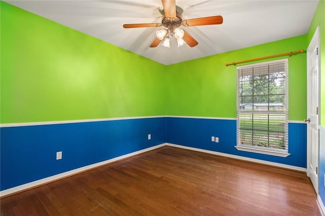 405 Baker Rd, Satsuma, AL 36572 - empty room with wood finished floors, baseboards, and ceiling fan
