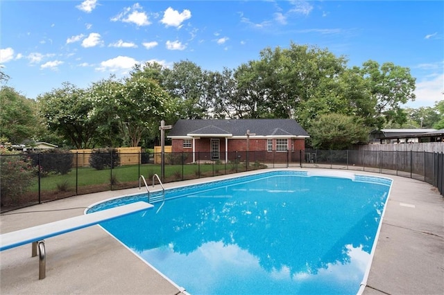 405 Baker Rd, Satsuma, AL 36572 - view of pool featuring a diving board and view of wooded area