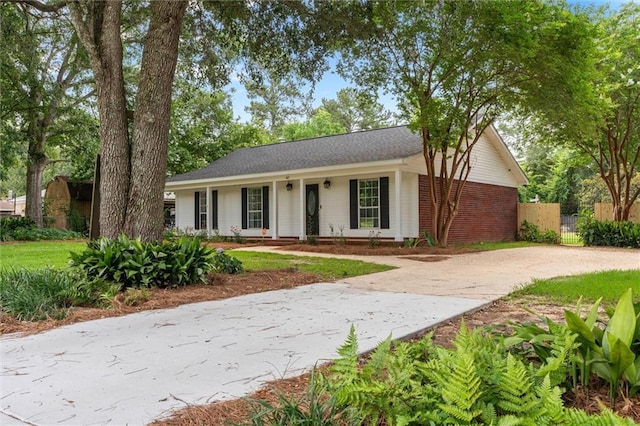 405 Baker Rd, Satsuma, AL 36572 - ranch-style house with concrete driveway and brick siding