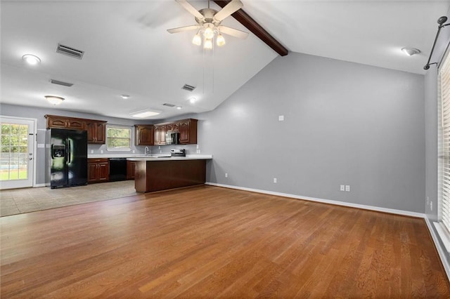 405 Baker Rd, Satsuma, AL 36572 - kitchen featuring black appliances, light wood-style flooring, light countertops, and ceiling fan