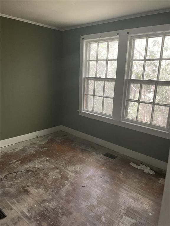 2065 Magnolia Ln, Mobile, AL 36605 - unfurnished room with healthy amount of natural light, ornamental molding, and baseboards