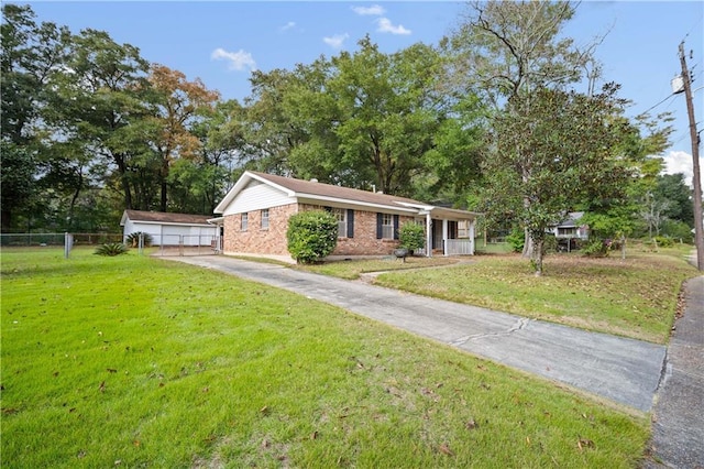 ranch-style house with a front yard