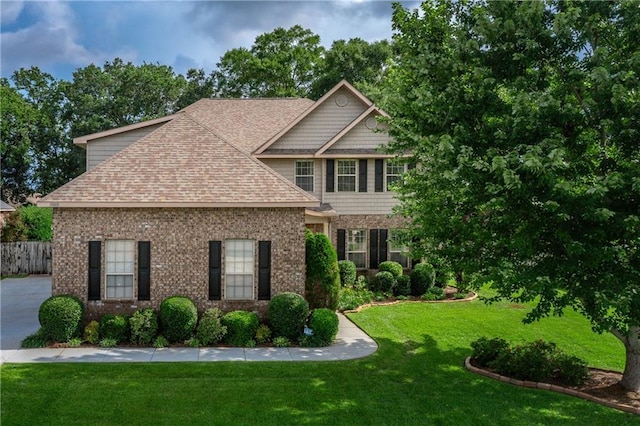 10808 Legacy Ln, Mobile, AL 36608 - view of front of house with a shingled roof and brick siding