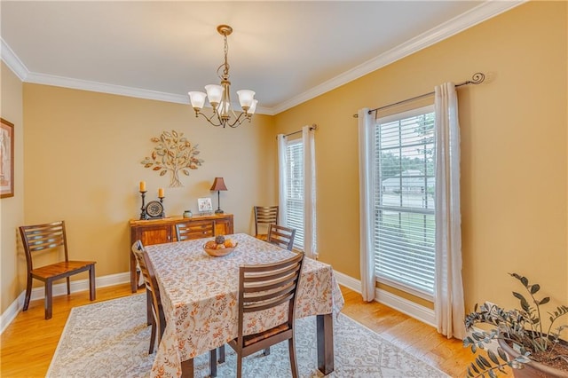 10808 Legacy Ln, Mobile, AL 36608 - dining area featuring ornamental molding, a chandelier, and light wood finished floors