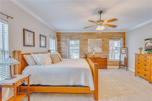 10808 Legacy Ln, Mobile, AL 36608 - bedroom featuring wooden walls, ornamental molding, multiple windows, light colored carpet, and ceiling fan
