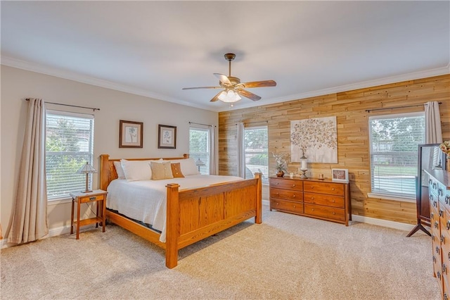 10808 Legacy Ln, Mobile, AL 36608 - bedroom featuring wooden walls, ornamental molding, light colored carpet, and a ceiling fan