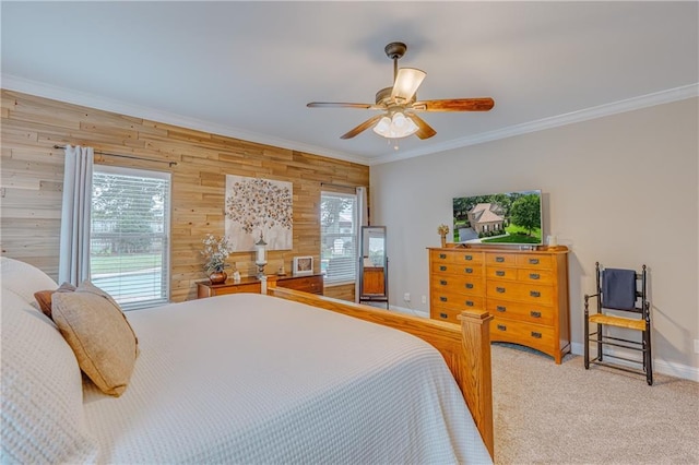10808 Legacy Ln, Mobile, AL 36608 - bedroom with wood walls, multiple windows, ornamental molding, carpet floors, and ceiling fan
