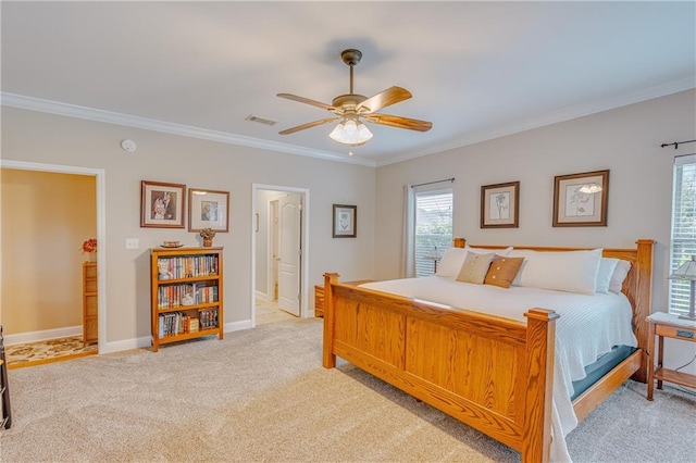 10808 Legacy Ln, Mobile, AL 36608 - bedroom featuring light carpet, crown molding, and a ceiling fan