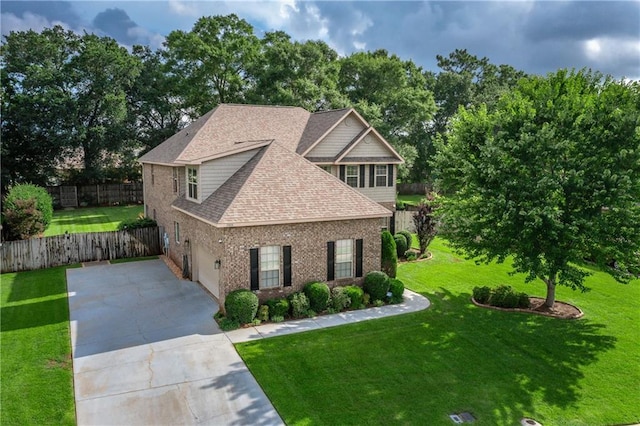 10808 Legacy Ln, Mobile, AL 36608 - view of front of property with driveway, brick siding, and a shingled roof