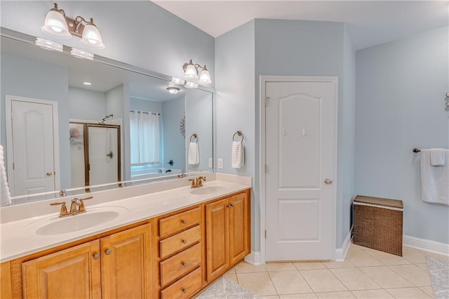 10808 Legacy Ln, Mobile, AL 36608 - full bath with a shower stall, tile patterned floors, and double vanity