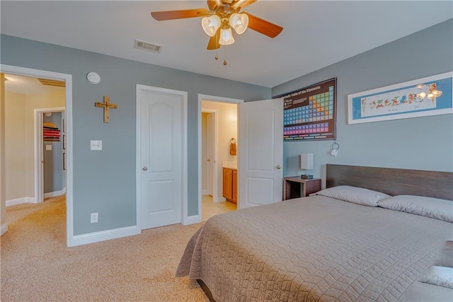 10808 Legacy Ln, Mobile, AL 36608 - bedroom featuring light carpet, ensuite bath, and ceiling fan