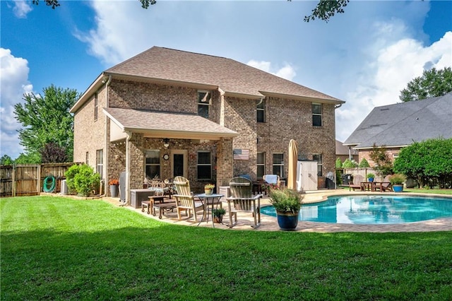 10808 Legacy Ln, Mobile, AL 36608 - back of property with a patio, a fenced backyard, and brick siding