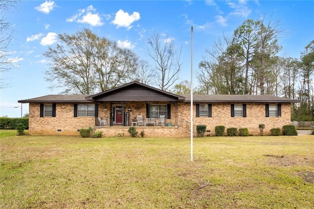 ranch-style house with a front yard and a porch