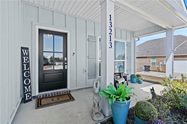 property entrance featuring covered porch