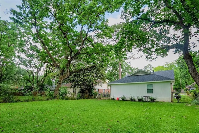 view of yard featuring fence