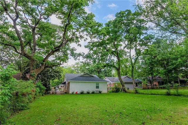 view of yard featuring fence